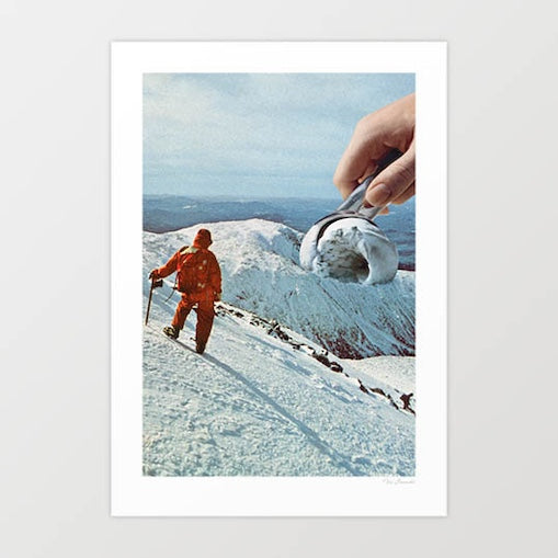 Surreal art print — a lone mountaineer in an orange suit climbing a snow-covered alpine peak while a giant hand descends holding an ice cream scoop scooping the snow like vanilla ice cream, quirky food and adventure wall art by Vertigo Artography